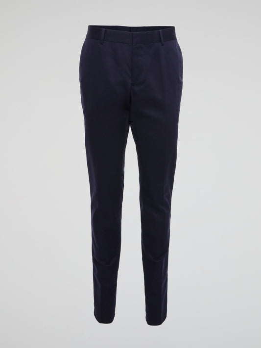 Imagine effortlessly commanding attention in any room with the sleek sophistication of these Navy Tapered Suit Pants by Roberto Cavalli. Crafted with precision and artistry, these pants exude confidence and power, making them a must-have staple for any modern gentleman's wardrobe. Elevate your style to new heights and turn heads with every stride in these statement-making trousers.
