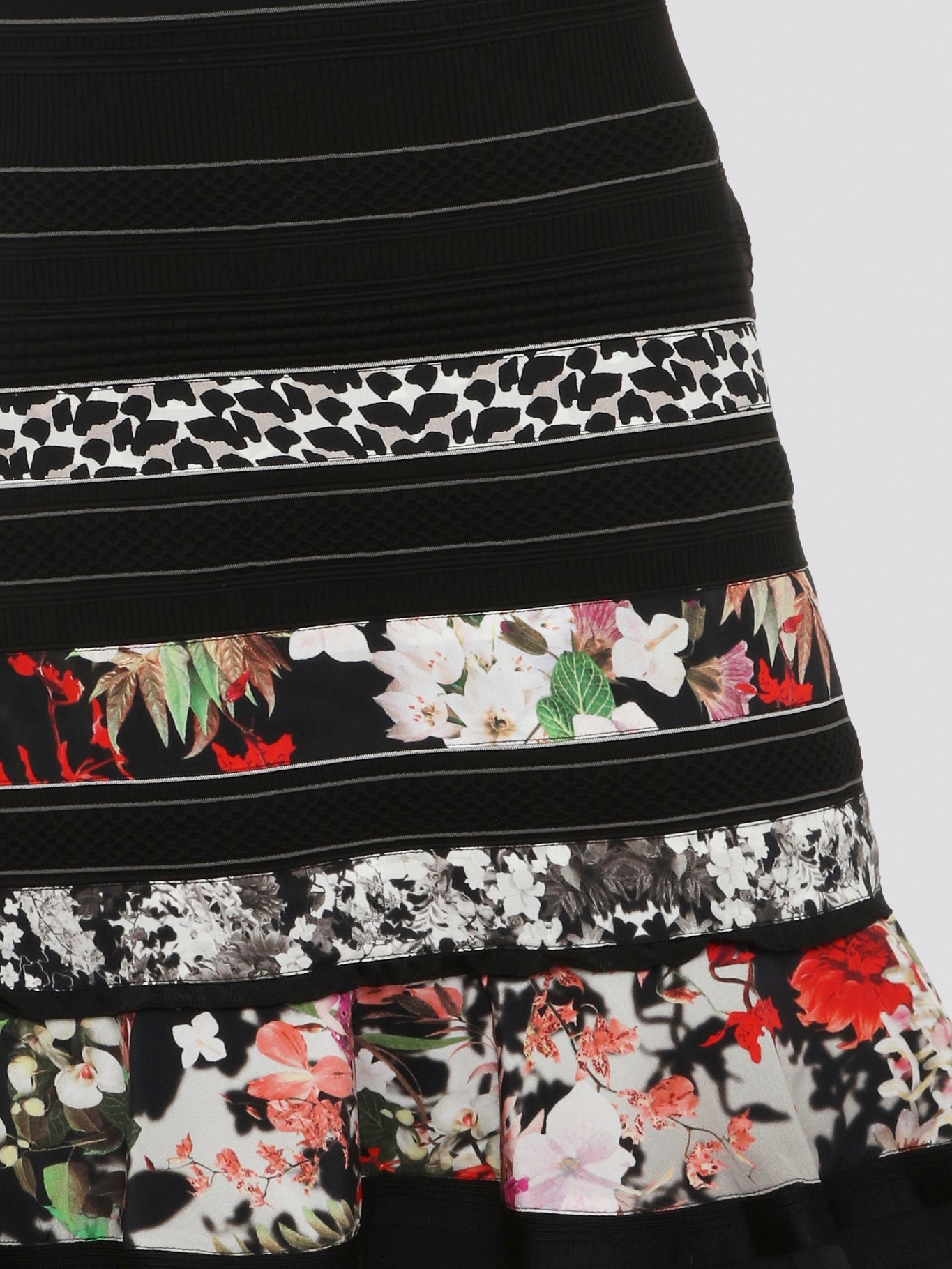 This stunning Mesh Neckline Flared Dress by Roberto Cavalli is the epitome of elegance and sophistication. Featuring a delicate mesh neckline that adds a touch of allure, this flared dress is perfect for any special occasion. With its flattering silhouette and luxurious design, you'll surely turn heads wherever you go in this show-stopping piece.