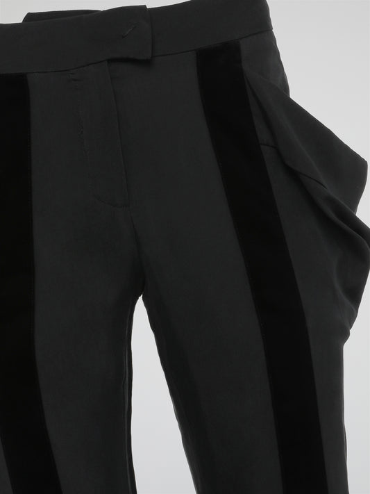 Step up your style game with these Grey Oversized Pocket Trousers by Roberto Cavalli. Crafted with the finest attention to detail, these trousers offer a perfect blend of sophistication and urban streetwear. The oversized pockets not only make a bold fashion statement, but also provide functionality for carrying all your essentials on the go.