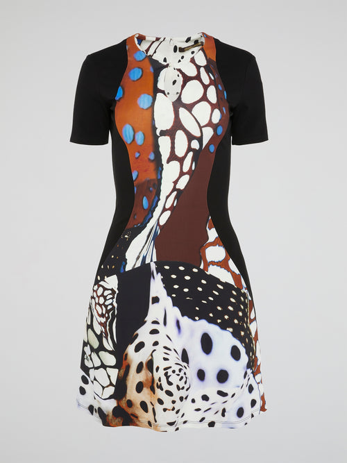 This gorgeous Abstract Print Keyhole Dress by Roberto Cavalli is a stunning addition to any wardrobe. The intricate design and keyhole cutout add a touch of femininity and elegance to this bold piece. You'll turn heads and make a statement wherever you go in this eye-catching dress.