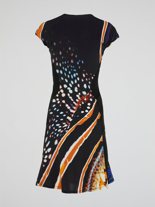 Indulge your inner fashionista with the Abstract Print V-Neck Dress by Roberto Cavalli - a masterpiece of style and sophistication that will turn heads wherever you go. The vibrant colors and bold patterns of this dress exude confidence and allure, making it a must-have for any woman who wants to make a statement. Embrace your individuality and show off your unique sense of fashion with this stunning piece that is sure to elevate your wardrobe to a whole new level.
