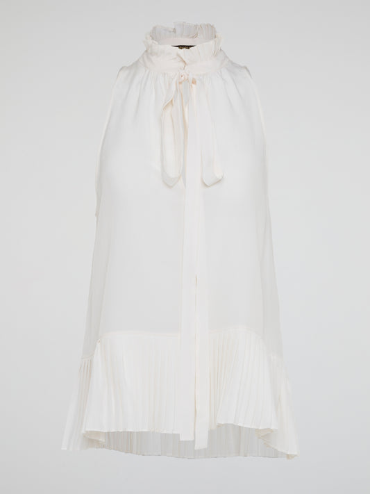 Elevate your summer wardrobe with the White Sleeveless Frill Top by Roberto Cavalli, a chic and feminine piece that exudes effortless elegance. Crafted with impeccable tailoring and delicate frill details, this top is perfect for any occasion, from casual brunches to evening soir茅es. Embrace your inner fashionista and turn heads wherever you go with this must-have addition to your closet.