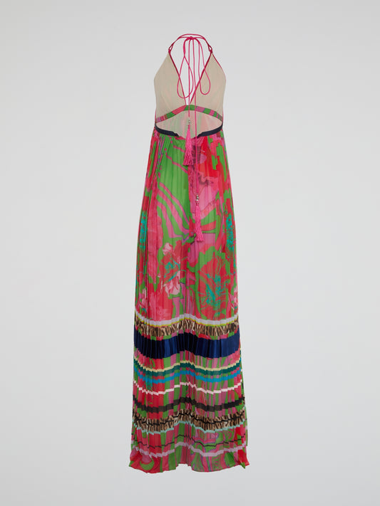Feel like a bohemian goddess in this stunning halter neck accordion maxi dress by Roberto Cavalli. The flowing fabric drapes beautifully, while the halter neck adds a touch of sophistication to the look. Perfect for a summer wedding or a night out on the town, this dress will make you feel effortlessly chic and stylish.