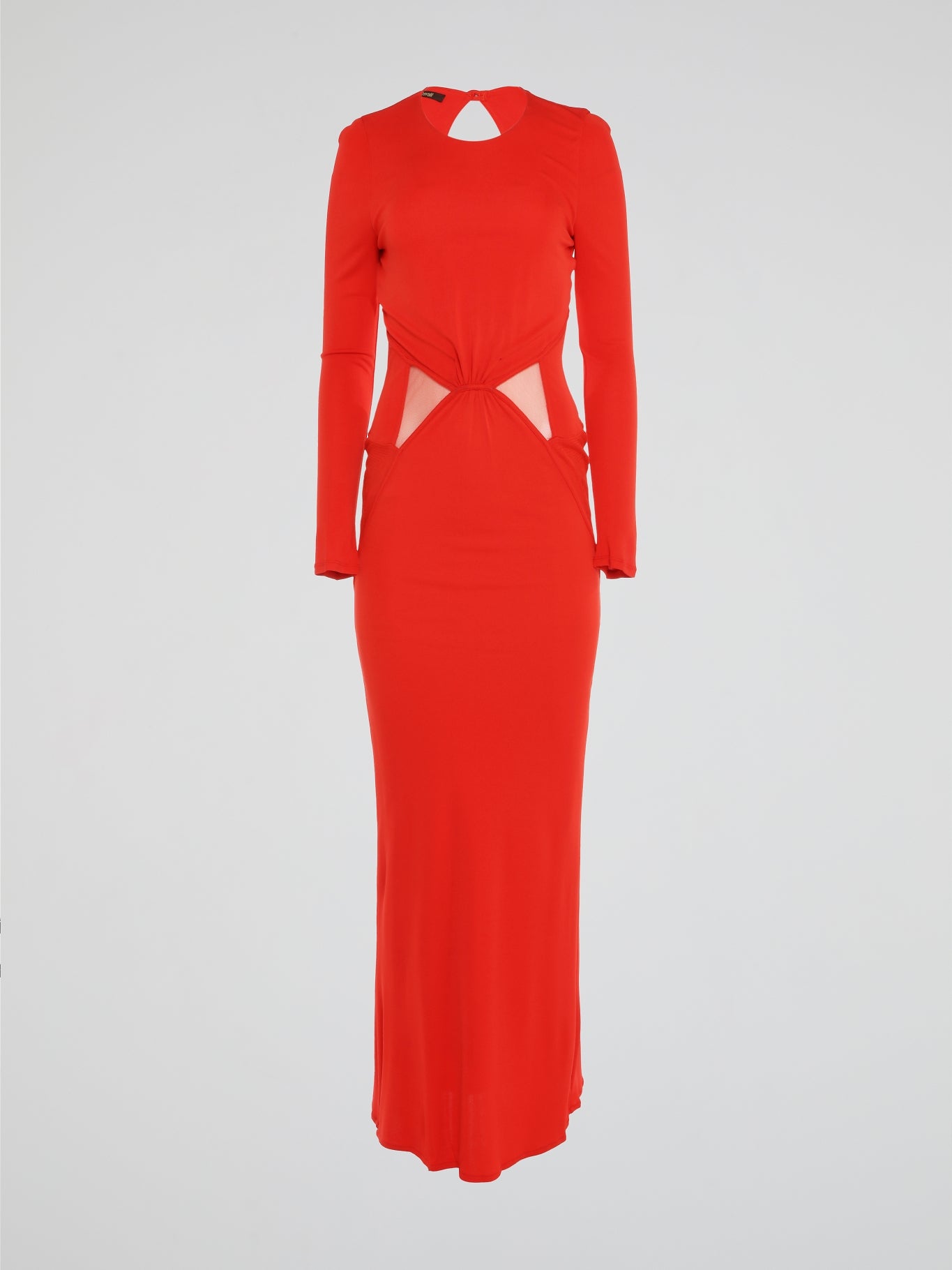 Introducing the Red Cut Out Long Sleeve Dress by Roberto Cavalli - a stunning masterpiece that combines elegance with a touch of daring. This eye-catching dress features strategically placed cut-outs that add a flirtatious allure, while the long sleeves provide a hint of mystery. Crafted with meticulous attention to detail, this luxurious dress is the perfect choice for the confident and sophisticated woman ready to make an unforgettable statement.