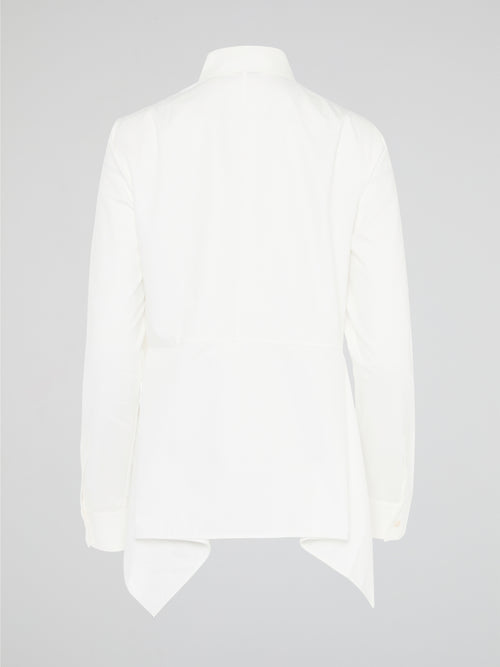 Turn heads and make a statement with the White High-Low Shirt from Akris Punto. Crafted with impeccable attention to detail, this modern twist on a classic silhouette is designed to elevate your style game. With its dynamic high-low hemline and luxurious fabric, this shirt is the epitome of effortless sophistication, perfect for any occasion.