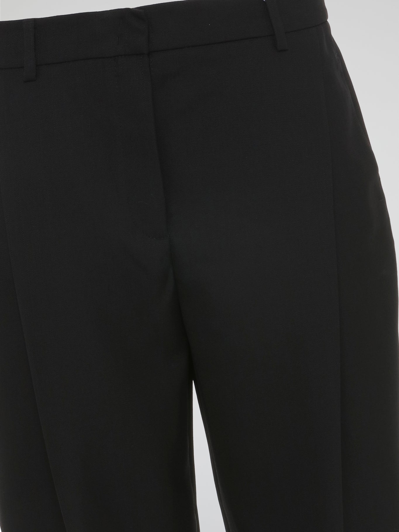 Step into the world of sophisticated style with our Black Pleated Capri Pants by Akris Punto. Crafted with meticulous precision, these pants effortlessly blend elegance and comfort. From the pleated detailing to the flattering capri length, these pants guarantee a chic and timeless addition to your wardrobe.