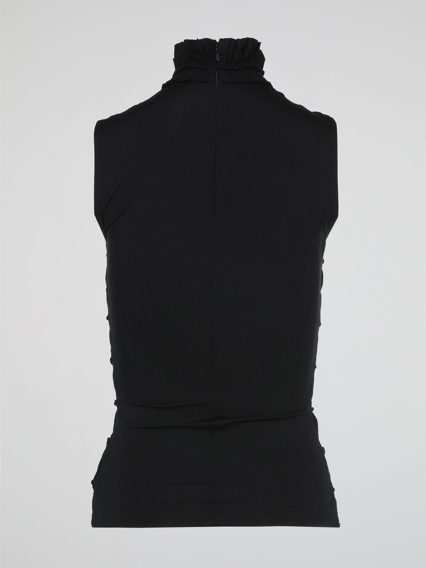 The Black High Neck Tiered Top by Akris Punto perfectly combines elegance and modernity in one stunning piece. With its high neckline and tiered design, this top effortlessly adds depth and movement to any ensemble. Whether paired with trousers for a chic office look or dressed up with a statement skirt for a special evening event, this top is a must-have addition to your wardrobe.