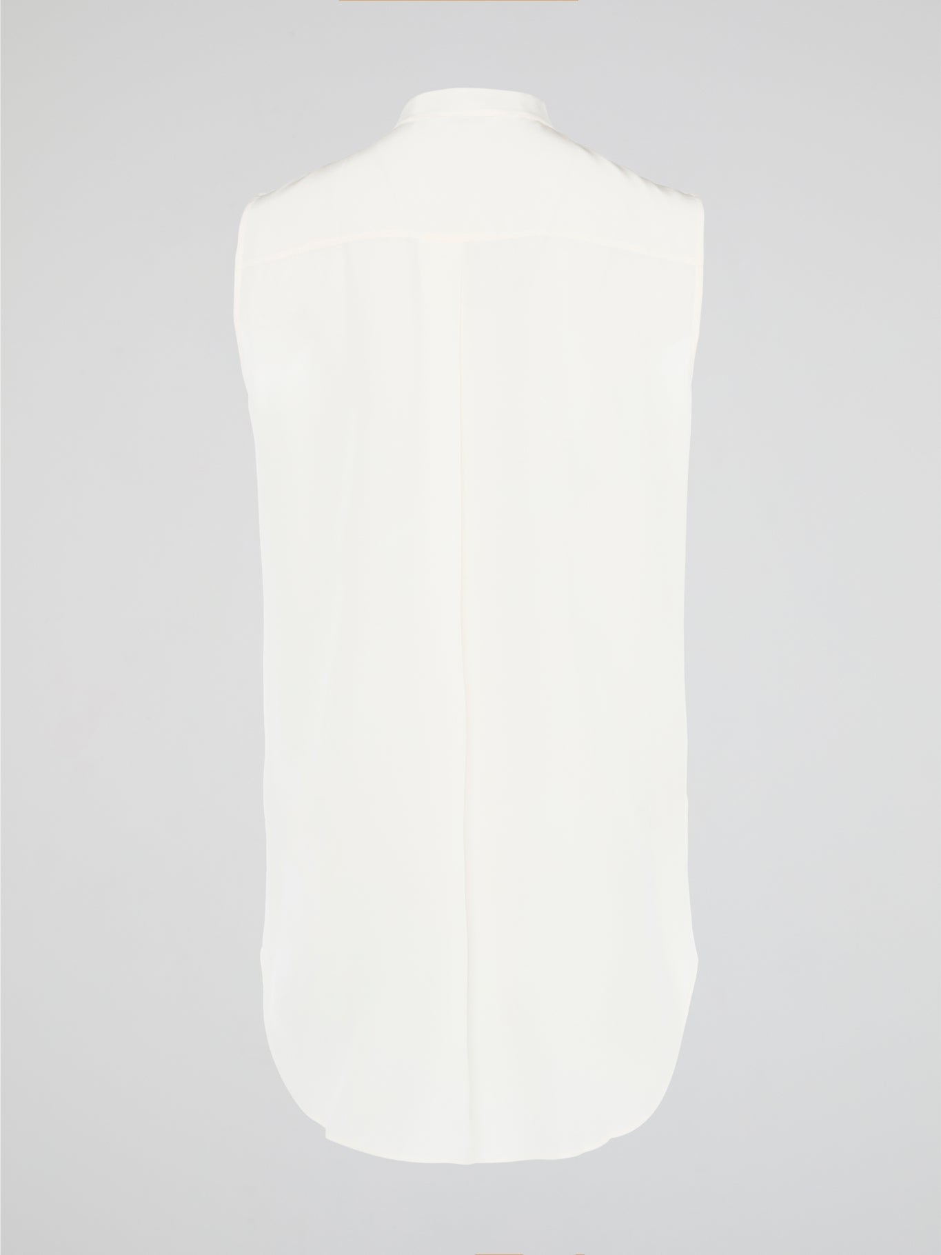 Unleash your fierce, fashion-forward side with the White Studded Sleeveless Shirt by Akris Punto. Crafted with meticulous attention to detail, this statement piece is adorned with intricately placed studs that exude edgy sophistication. Perfectly blending poise and rebellious spirit, this sleeveless shirt is a captivating must-have for those seeking to redefine their style game.