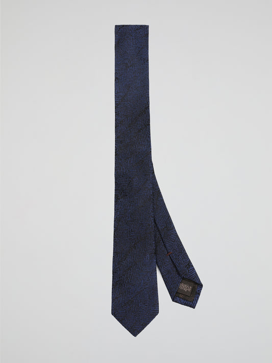 Elevate your style with the Navy Jacquard Neck Tie by Roberto Cavalli, a true blend of sophistication and statement-making fashion. Crafted with meticulous attention to detail, this exquisite necktie features a mesmerizing jacquard pattern in deep navy blue, creating a subtle texture that effortlessly highlights your impeccable taste. From formal occasions to casual elegance, this Roberto Cavalli masterpiece is the perfect accessory to add a touch of Italian luxury to any ensemble.