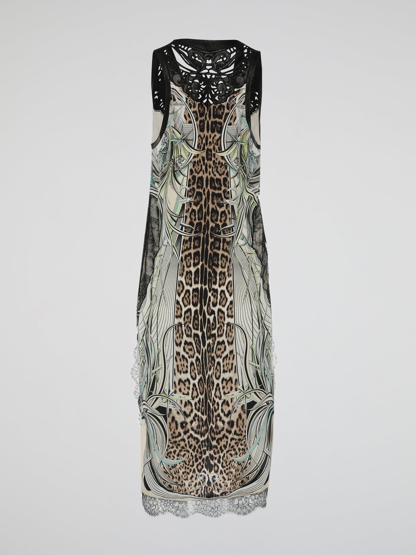 Step into the cradle of couture with our attention-grabbing Printed Sleeveless V-Neck Dress by Roberto Cavalli. Crafted with impeccable detail, this dress boasts a mesmerizing blend of vibrant colors and extravagant patterns that effortlessly command the spotlight. Embrace your inner fashionista and let this daring ensemble take you from elegant evenings to unforgettable adventures.