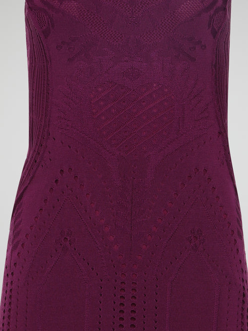 Step into elegance and luxury with the Roberto Cavalli Burgundy Knitted Dress. This enchanting creation showcases a timeless silhouette, crafted with meticulous attention to detail. The rich burgundy hue, paired with exquisite knitted textures, effortlessly exude sophistication, making it a stunning addition to any wardrobe.