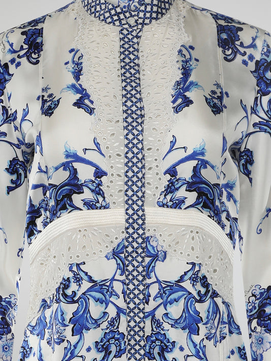 Introducing the epitome of elegance and avant-garde fashion: the Baroque Print Shirt Dress by Roberto Cavalli. This enchanting ensemble combines the timeless charm of baroque aesthetics with a modern twist, exuding confidence and sophistication in every thread. From its meticulously crafted detailing to its flowing silhouette, this dress is a masterpiece that effortlessly turns heads wherever it goes.