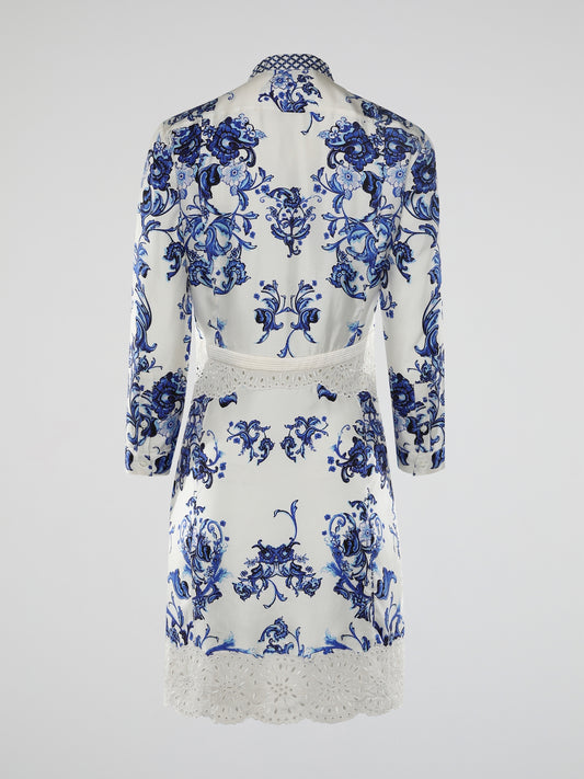 Introducing the epitome of elegance and avant-garde fashion: the Baroque Print Shirt Dress by Roberto Cavalli. This enchanting ensemble combines the timeless charm of baroque aesthetics with a modern twist, exuding confidence and sophistication in every thread. From its meticulously crafted detailing to its flowing silhouette, this dress is a masterpiece that effortlessly turns heads wherever it goes.