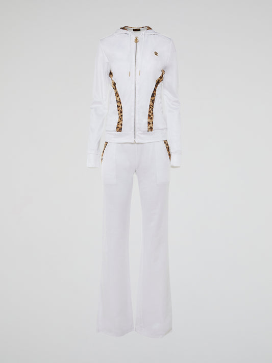 Step into the wild side of fashion with our White Leopard Panel Tracksuit by Roberto Cavalli. This sleek and stylish ensemble combines the elegance of Italian design with the fierce beauty of a white leopard pattern. Crafted with premium fabrics and adorned with Cavalli's signature logo, this tracksuit is a bold statement piece that will make you feel like the ruler of the fashion jungle.