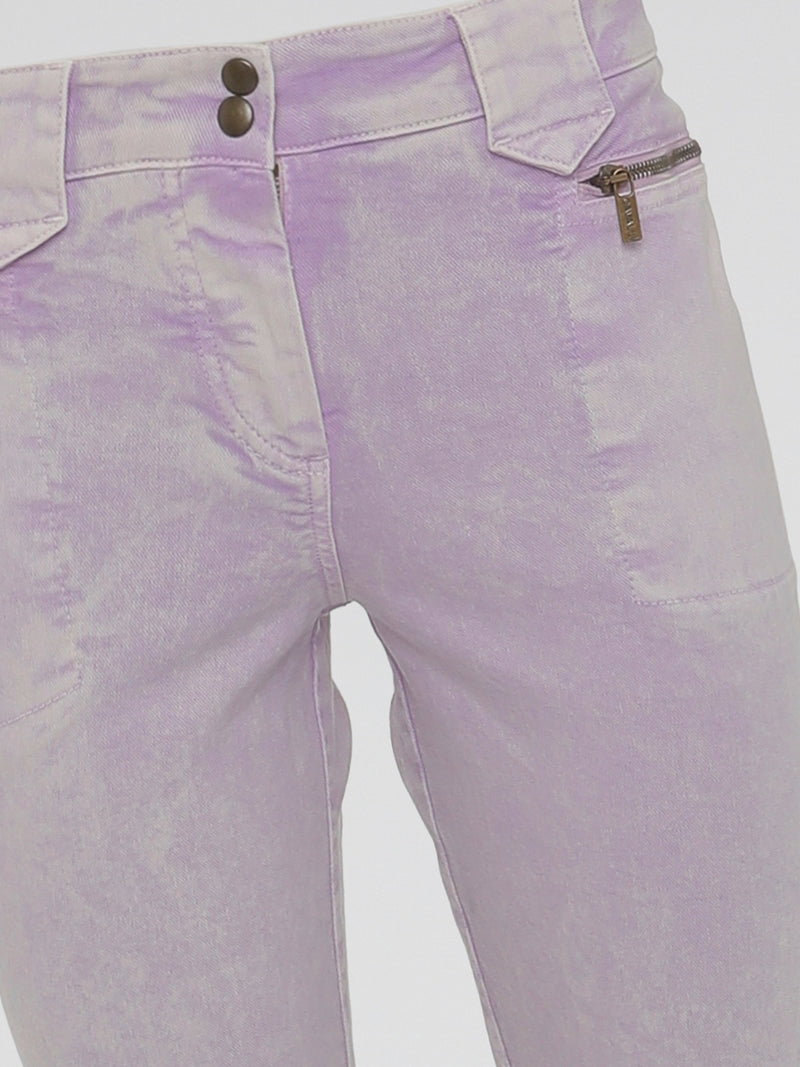 Introducing the Purple Acid Wash Jeans by Roberto Cavalli - a bold and captivating take on timeless denim! These jeans redefine edginess with their vibrant purple hue and distressed acid wash, effortlessly bringing an element of rock 'n' roll to your wardrobe. Crafted with Cavalli's attention to detail, they offer unparalleled comfort and a stylishly rebellious statement for the fashion-forward rebels!