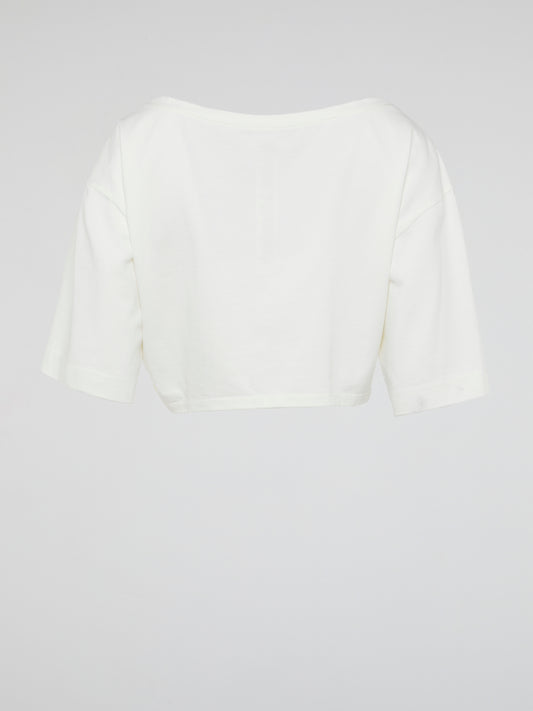 Introducing the White Crop Top by Roberto Cavalli, where elegance meets modern femininity. Crafted with luxurious fabrics and meticulous attention to detail, this wardrobe staple exudes effortless sophistication. From casual brunches to glamorous evenings, this versatile piece is guaranteed to turn heads and make a bold fashion statement.