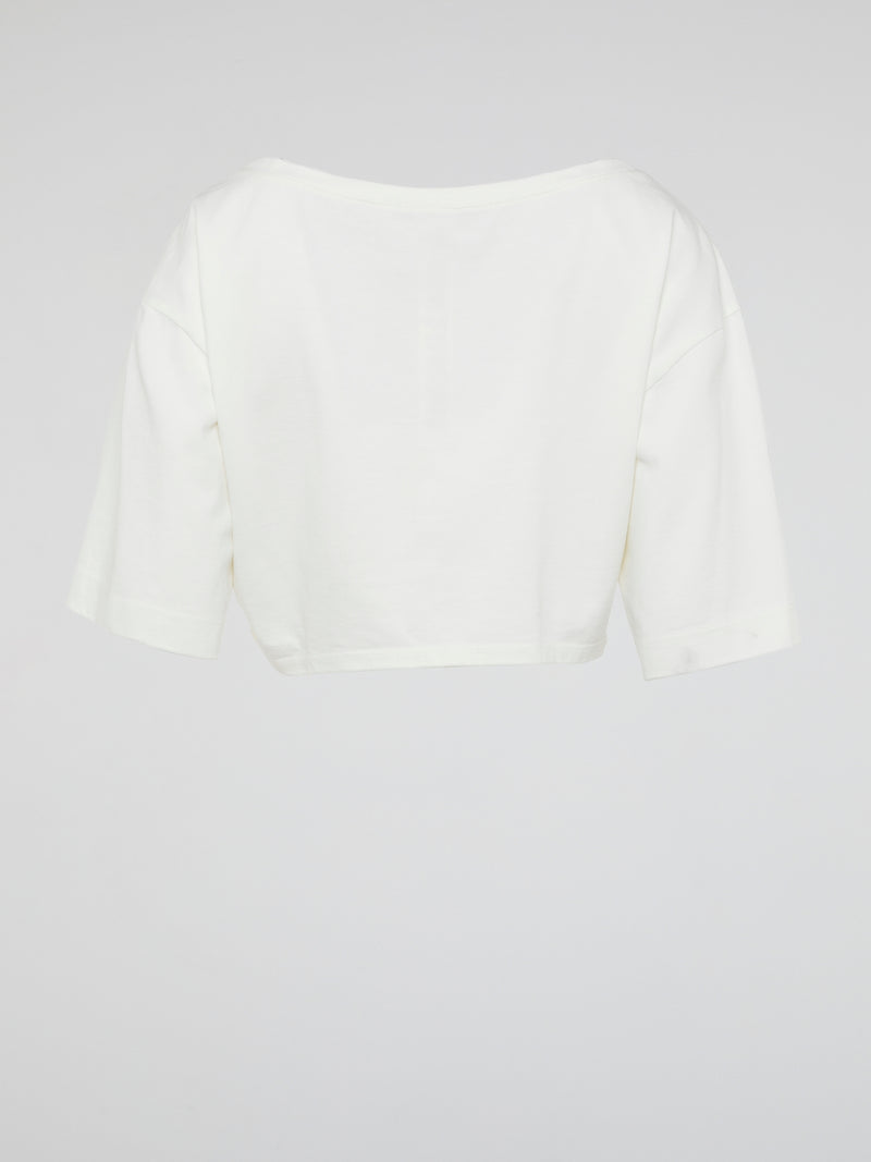 Introducing the White Crop Top by Roberto Cavalli, where elegance meets modern femininity. Crafted with luxurious fabrics and meticulous attention to detail, this wardrobe staple exudes effortless sophistication. From casual brunches to glamorous evenings, this versatile piece is guaranteed to turn heads and make a bold fashion statement.