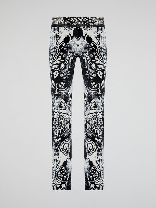 Elevate your wardrobe with our Roberto Cavalli Printed Skinny Trousers, designed to make a bold fashion statement. Crafted from luxurious fabrics and featuring a vibrant print, these trousers are the perfect combination of style and comfort. Whether you're heading to the office or a night out on the town, these trousers will ensure all eyes are on you.