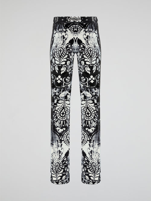 Elevate your wardrobe with our Roberto Cavalli Printed Skinny Trousers, designed to make a bold fashion statement. Crafted from luxurious fabrics and featuring a vibrant print, these trousers are the perfect combination of style and comfort. Whether you're heading to the office or a night out on the town, these trousers will ensure all eyes are on you.