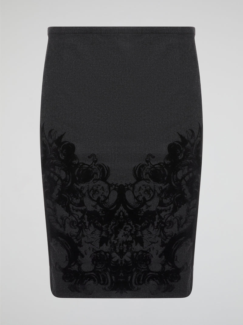 Elevate your office attire with this stunning grey printed pencil skirt from iconic designer Roberto Cavalli. The intricate pattern adds a touch of sophistication and style, making you stand out from the crowd. Pair it with a crisp white blouse and heels for a polished and fashion-forward look that will turn heads wherever you go.