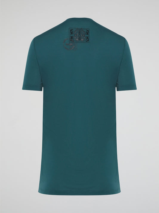 Elevate your casual style with the Green Printed T-Shirt from Roberto Cavalli, featuring a bold and eye-catching design that is sure to turn heads. Crafted from high-quality materials, this shirt offers both comfort and sophistication, making it the perfect addition to any fashion-forward wardrobe. Whether paired with jeans for a laid-back look or dressed up with a blazer for a night out, this t-shirt is a versatile and trendy choice for any occasion.