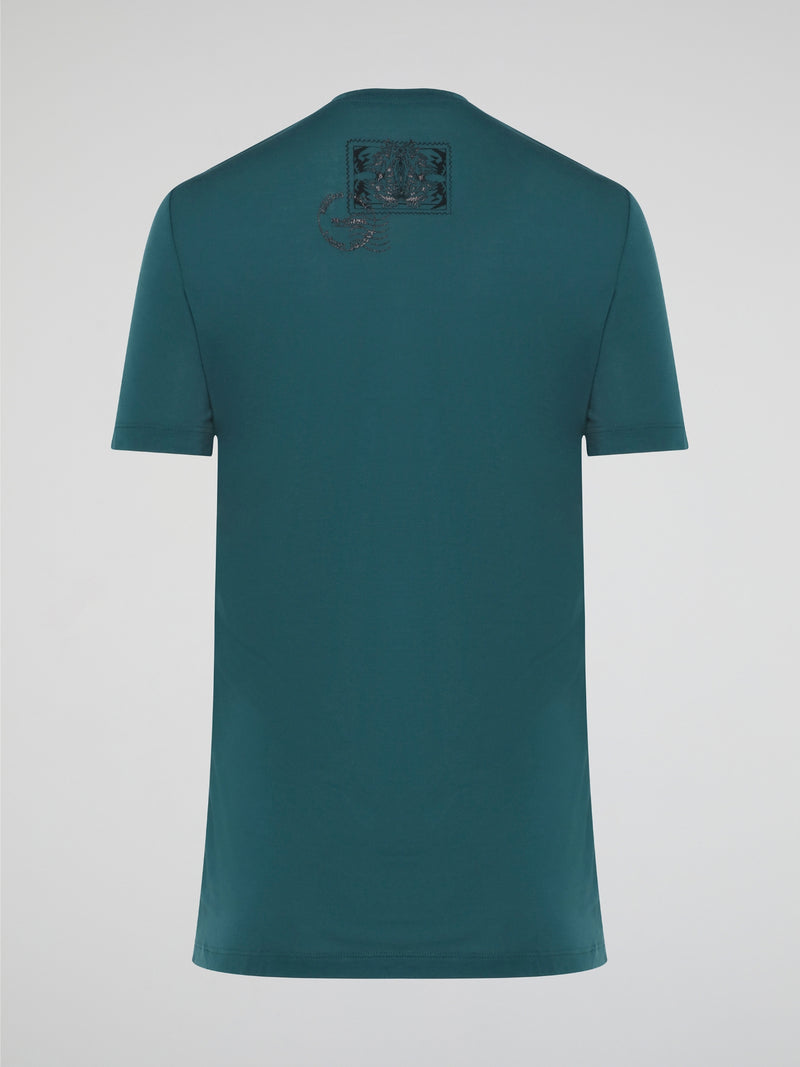 Elevate your casual style with the Green Printed T-Shirt from Roberto Cavalli, featuring a bold and eye-catching design that is sure to turn heads. Crafted from high-quality materials, this shirt offers both comfort and sophistication, making it the perfect addition to any fashion-forward wardrobe. Whether paired with jeans for a laid-back look or dressed up with a blazer for a night out, this t-shirt is a versatile and trendy choice for any occasion.