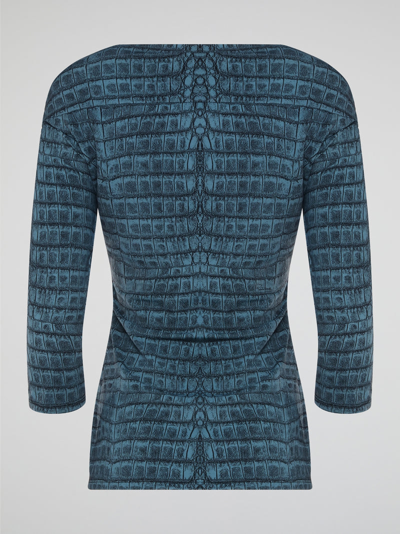 Step into the wild side with this Reptilian 3/4 Sleeve Top by Roberto Cavalli, featuring a striking reptile-inspired print that will turn heads wherever you go. Made from luxurious and soft fabric, this top is not only stylish but also comfortable to wear all day long. Elevate your wardrobe with a touch of exotic flair with this statement piece from Roberto Cavalli.