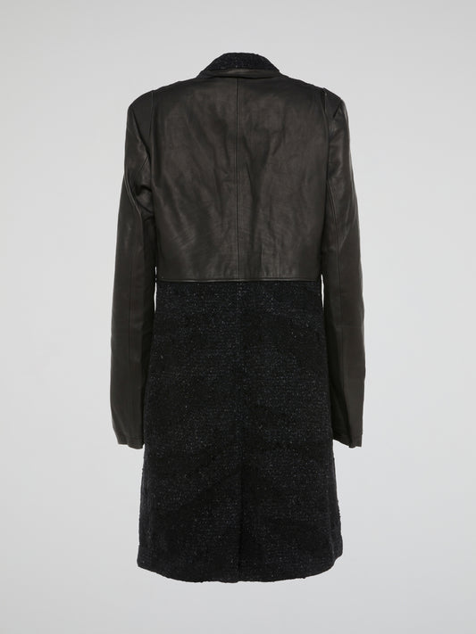 Step out in style and sophistication with our Tweed Panel Trench Coat from Roberto Cavalli. Made from luxurious materials and featuring intricate tweed detailing, this coat is a timeless addition to any wardrobe. Stand out from the crowd and make a statement with this elegant and unique piece.