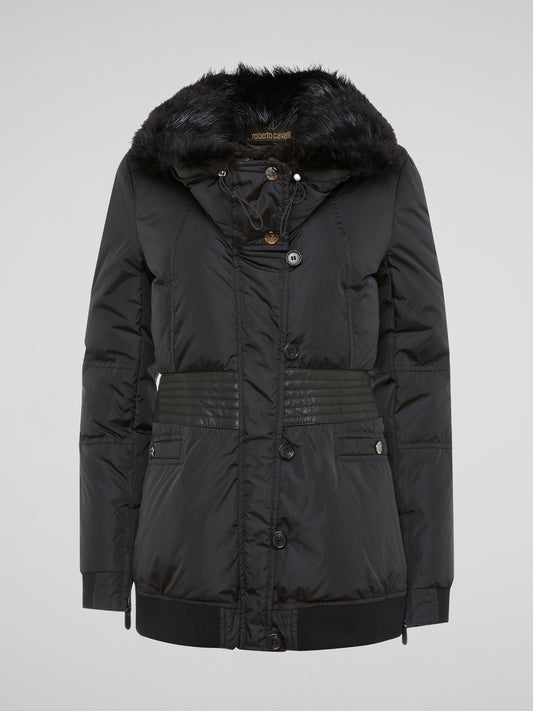Step out in style and luxury with the Black Fur Collar Parka from Roberto Cavalli - a statement piece that exudes sophistication and elegance. Crafted with attention to detail and featuring a lavish fur collar, this parka is sure to turn heads wherever you go. Embrace the chilly weather with warmth and glamour, perfect for the fashion-forward individual.