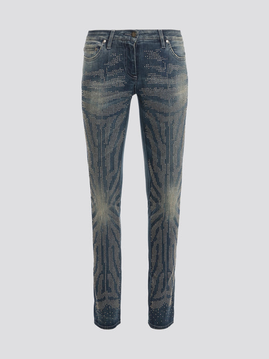 Unleash your inner rockstar with these statement-making Blue Studded Denim Jeans by Roberto Cavalli. The edgy studs add a touch of glamour to the classic denim silhouette, making these jeans a must-have for any fashion-forward individual. Stand out from the crowd and elevate your wardrobe with these show-stopping jeans that are sure to turn heads wherever you go.