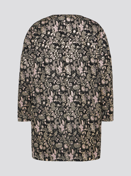 Step out in style with the Foliage Embroidered Coat from Msgm. This statement piece features intricate floral embroidery that adds a pop of color and texture to any outfit. Perfect for adding a touch of elegance to your wardrobe, this coat is a must-have for the fashion-forward individual.
