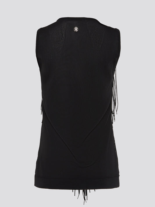 Make a statement with this stunning Black Fringe Detailed Top by Roberto Cavalli. Embellished with intricate fringe detailing, this top exudes luxury and elegance. Whether paired with jeans for a casual look or dressed up with a sleek skirt for a night out, this top is sure to turn heads wherever you go.