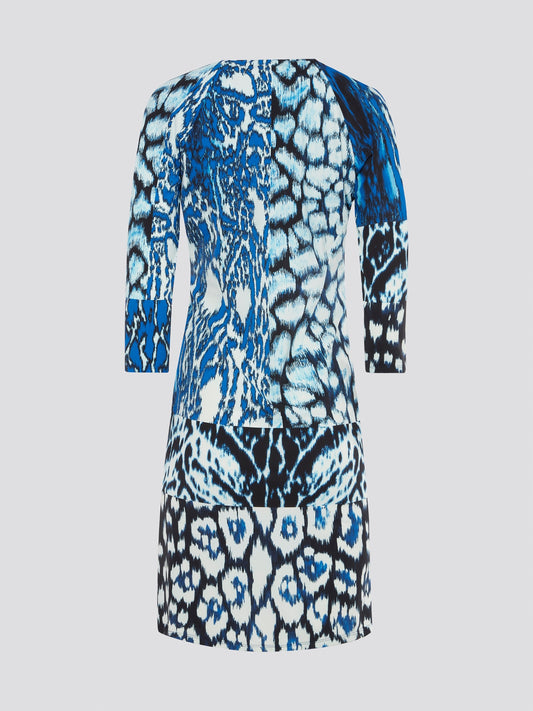 Indulge your wild side with the Blue Animal Print Plunge Dress by Roberto Cavalli - a fierce and fabulous statement piece that will turn heads wherever you go. The plunging neckline adds a touch of allure while the bold animal print exudes confidence and style. Step into this dress and unleash your inner fashionista for a night out on the town.