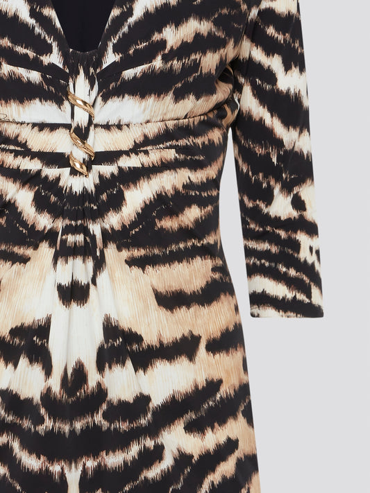 Step into the wild side with this alluring brown animal print plunge dress by Roberto Cavalli. The sleek silhouette perfectly accentuates your curves while the striking print adds a touch of bold elegance. Whether you're hitting the town or attending a special event, this dress is sure to turn heads and make a statement.