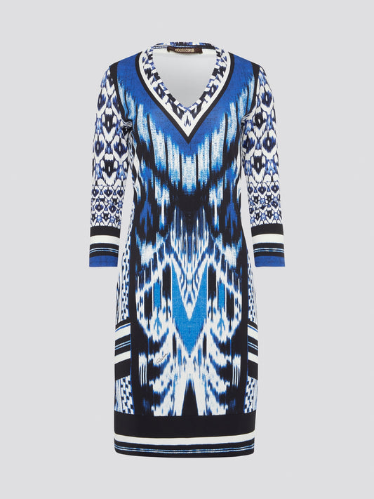 Make a statement with this striking blue printed long sleeve dress by Roberto Cavalli. The intricate design and flowing silhouette add a touch of elegance and drama to any outfit. Perfect for a night out or a special event, this dress is sure to turn heads and make you feel like a true fashion icon.