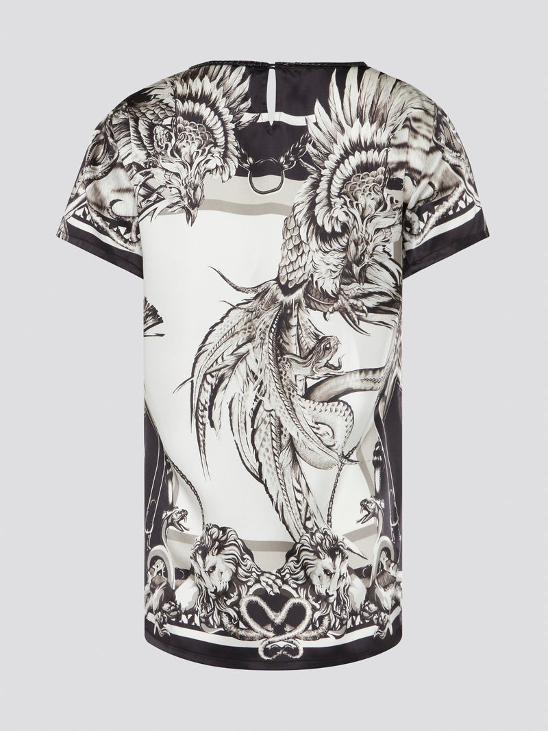 Elevate your everyday look with this Printed Round Neck Top from Roberto Cavalli. Featuring a bold and vibrant print, this top is perfect for making a statement wherever you go. Made with high-quality materials, this top is both comfortable and stylish, making it a must-have addition to your wardrobe.