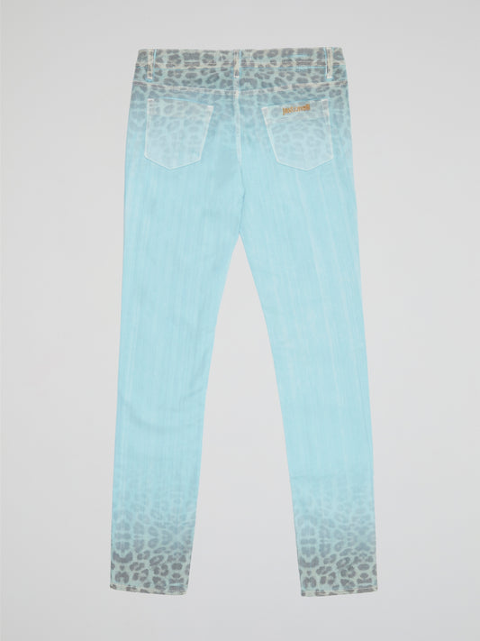 Unleash your wild side with these Blue Leopard Gradient Pants by Just Cavalli. Crafted from luxurious fabric that hugs your curves in all the right places, these pants feature a mesmerizing gradient pattern that transitions from deep indigo to fierce leopard print. Step out in style and make a statement with these bold and trendy pants that are sure to turn heads wherever you go.