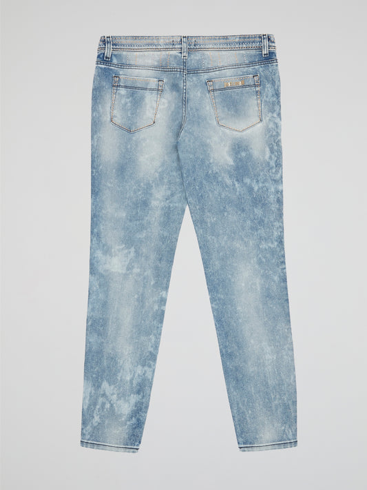 Step out in bold style with these Acid Wash Studded Jeans by Just Cavalli. The acid wash effect adds a touch of vintage cool, while the studded embellishments bring a modern edge to the classic denim design. Perfect for adding an edgy flair to any outfit, these jeans are sure to turn heads wherever you go.